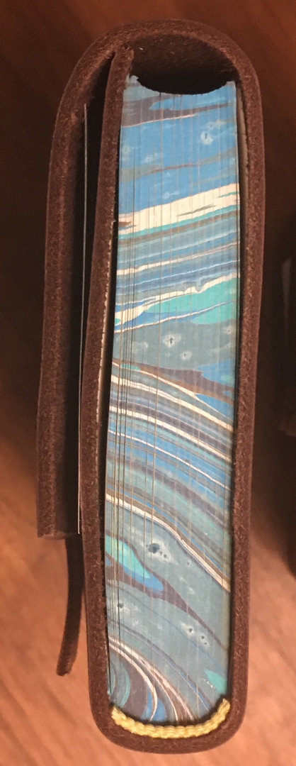 Leder notitieboek piccolo Siena met gemarmerde rand blauw